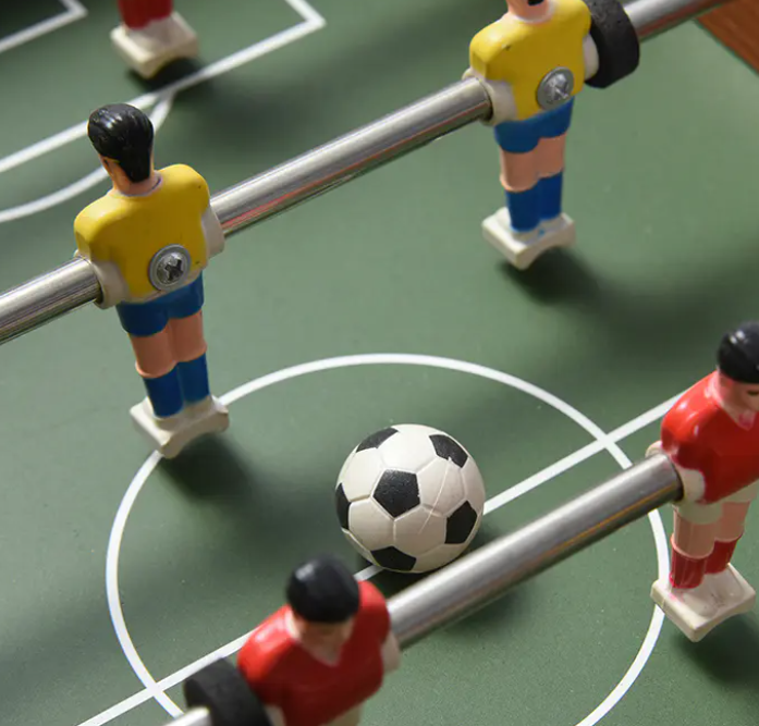 Hvordan bordfodboldspil forbedrer teambuilding og produktivitet på arbejdspladsen?